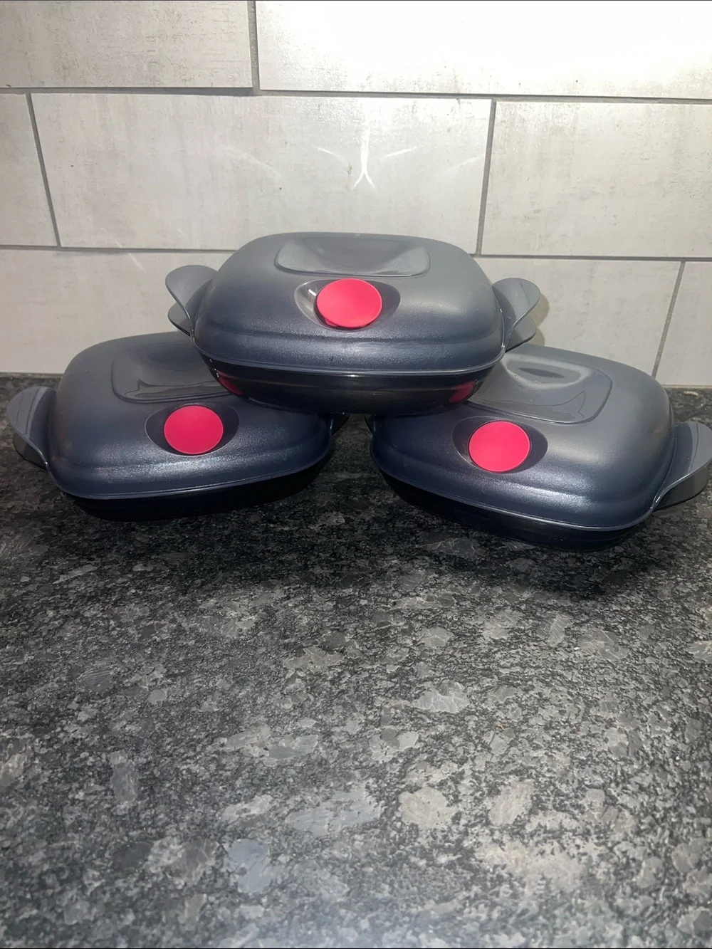 Tupperware microwave HEAT N SERVE Containers with Pink vent. Reheat lunches
